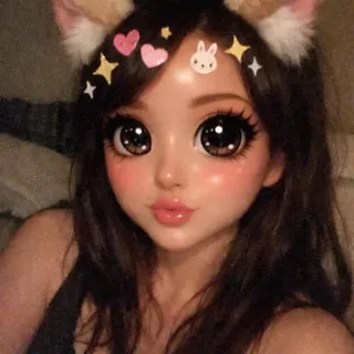 Selfie under a cartoon filter with cat ears, huge eyes and stickers